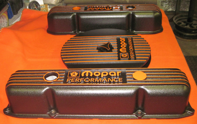 One-off custom Mopar Performance valve covers and air cleaner assembly in Hemi Orange and Wetstone Black