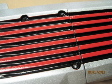 Close up of custom Jeep intake plenum in Alien Silver, Flag Red and Ink Black