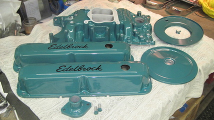 Small block Mopar Edelbrock intake manifold, air cleaner assembly, valve covers and water neck in Clear Vision over Sea Water Teal