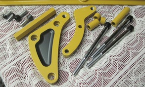 Close up of small block Mopar brackets and hardware in Corsair Gold and Silk Satin Black