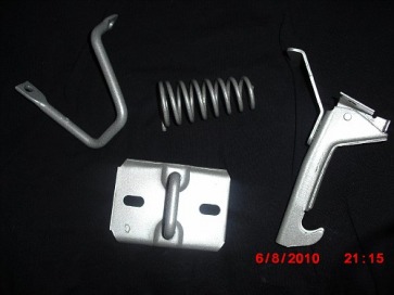 A Body Mopar hood latch assembly in Silver Glaze